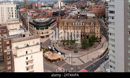 LEEDS, UK - AUGUST 10, 2024.  Aerial view of modern and ancient architecture side by side in City Square, Leeds with The General Post Office and The M Stock Photo