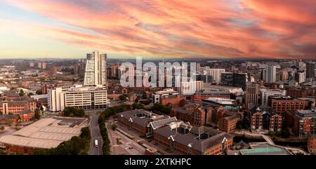 LEEDS, UK - AUGUST 10, 2024.  An aerial panoramic view of Leeds cityscape skyline with Granary Wharf and Bridgewater Place skyscraper at sunrise Stock Photo