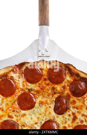 Closeup of a Pepperoni Three Cheese Pizza on a Peel isolated on white. Stock Photo