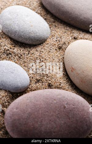 Close up view of pebbles on sand. Zen concept Stock Photo
