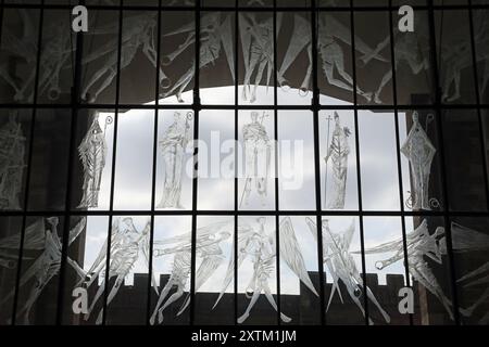 Screen of Saints and Angels at Coventry Cathedral by John Hutton Stock Photo