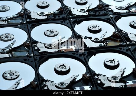 Many Open Hard drives isolated on white background. Frame àre combined ...