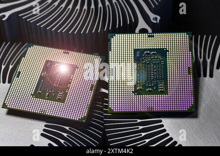 detail of cpu chip processor on aluminum heat sink cooler and lights effects Stock Photo