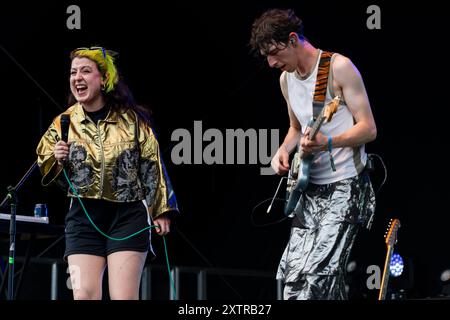 GREEN MAN FESTIVAL, BRECON, WALES, UK - AUGUST 15 2024: Welsh language band HMS Morris play an energetic set on the Walled Garden Stage. Day One of the Green Man Festival 2024 at Glanusk Park, Brecon, Wales. Photo: Rob Watkins/Alamy Live News. Stock Photo