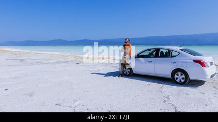 November 08, 2019: Tourists on the Salty Surface of the Lake Assal, Djibouti Stock Photo