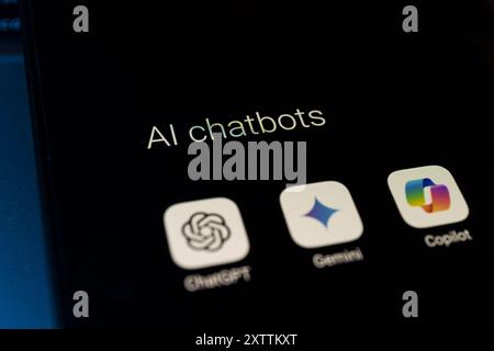 Artificial intelligence assistant language models on smartphone screen. ChatGPT, Gemini and Copilot Stock Photo
