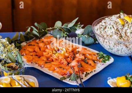 platter of lox and bowl of tuna salad at bar mitzvah brunch event Stock Photo