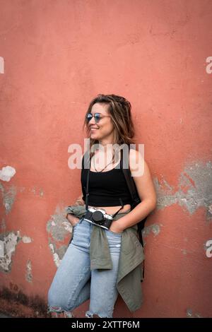 Woman with Vintage Camera on an Adventure Stock Photo