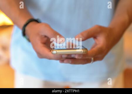 Image of hands using a smartphone Stock Photo