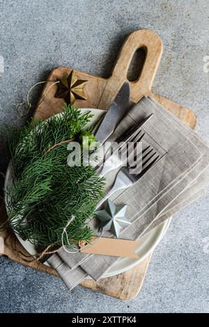 Christmas table setting with fresh thujia Stock Photo
