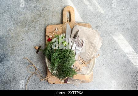 Christmas table setting with fresh thujia Stock Photo
