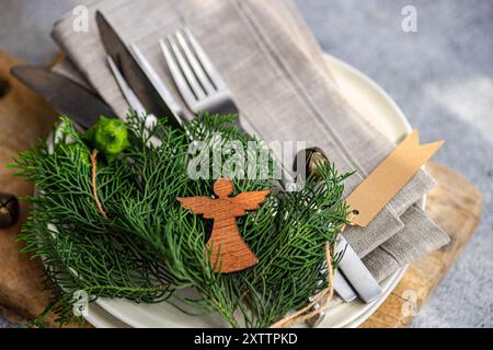 Christmas table setting with fresh thujia Stock Photo