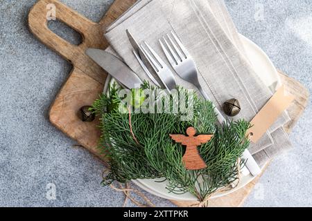 Christmas table setting with fresh thujia Stock Photo