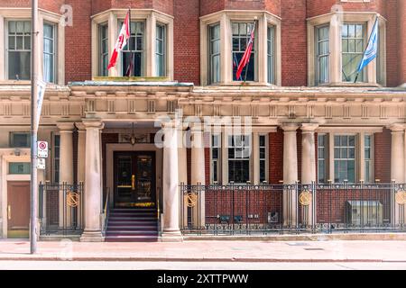 Toronto, Canada - August 14, 2024: Colonial architecture in the National Club building. Located at 303 Bay St., the structure is a famous place. Stock Photo