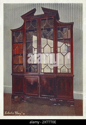 Möbel um die Jahrhundertwende 1900, Geschnitztes Chippendale-Bibliotheksregal 1910 - 1911, Carved Chippendale library bookcase 1910 - 1911.jpg Stock Photo