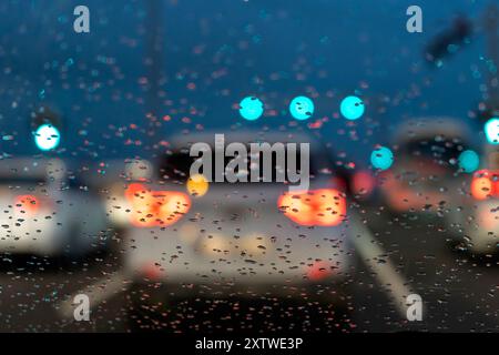 Raindrops on bus window and lights doha corniche Stock Photo