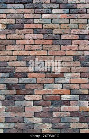 Beautiful background of burnt vintage red brick Stock Photo