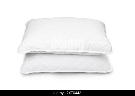 White hypoallergenic pillow in hotel or resort room is isolated on white background with clipping path. Stock Photo