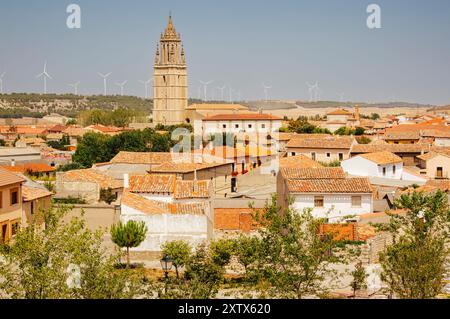 Historic Ampudia Townscape with Wind Turbines (Castile and Leon, Spain) Stock Photo