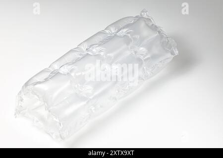 Plastic translucent air packaging, Plastic translucent packaging with air cushion. Inflatable air bag isolated on white background. Stock Photo