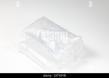 Plastic translucent air packaging, Plastic translucent packaging with air cushion. Inflatable air bag isolated on white background. Stock Photo