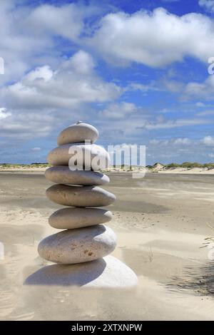 Stones, pebbles, pebble tower on the beach of the island of Borkum, island of Borkum, Lower Saxony, Federal Republic of Germany Stock Photo