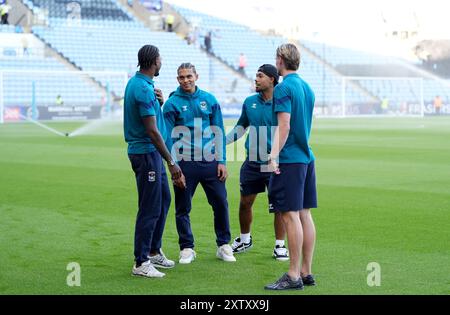 Coventry City players inspect the pitch before the Sky Bet Championship match at The Coventry Building Society Arena, Coventry. Picture date: Friday August 16, 2024. Stock Photo