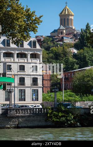 Tbilisi, Georgia - October 8, 2023: Tbilisi landmsrk witk Holy Trinity Cathedral on the hill Stock Photo