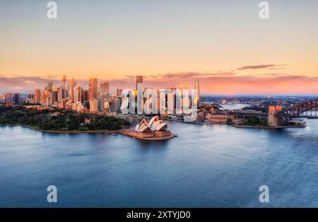 Waterfront of Sydney city CBD architecture landmarks on shores of Sydney Harbour aerial cityscape. Stock Photo