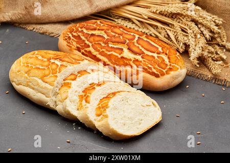 Freshly baked tiger bread loaf with crispy golden crust, perfect for sandwiches and toast Stock Photo