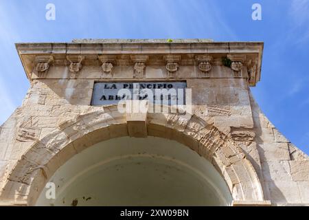 CADIZ, SPAIN - MAY 23, 2024:  Arch and sign on the original arcaded square of the Central Market (Mercado Central) recognising its building in 1837 Stock Photo