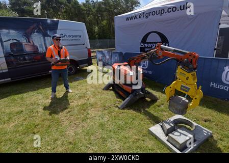A Husqvarna DXR 95 mini remote control digger and demolition robot demonstrated at the Rail Live railway industry show, June 2024 Stock Photo