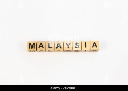 Malaysia Text on Wooden Blocks with White Background Stock Photo