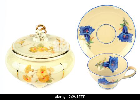 Vintage porcelain tableware: small coffee cup with saucer and elegant candy bowl isolated on white background. Collage. Stock Photo