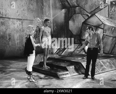 ROGER VADIM directing JANE FONDA and JOHN PHILLIP LAW on the set of BARBARELLA 1968 Director ROGER VADIM  Writer JEAN CLAUDE FOREST  Costume Design JACQUES FONTERAY and PACO RABANNE Production Designer MARIO GARBUGLIA Cinematography CLAUDE RENOIR Paramount Pictures Stock Photo