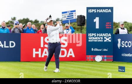 North Ayrshire, Scotland. 17th August 2024. Megan Khang tees off during the 3rd round of the 2024 ISPS HANDA Women’s Scottish Open at Dundonald Links. Credit: Tim Gray/Alamy Live News Stock Photo