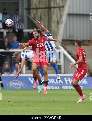 Southend United's Harry Cardwell challenges for a header with Hartlepool United's Luke Waterfall and Louis Stephenson during the Vanarama National League match between Hartlepool United and Southend United at Victoria Park, Hartlepool on Saturday 17th August 2024. (Photo: Mark Fletcher | MI News) Credit: MI News & Sport /Alamy Live News Stock Photo