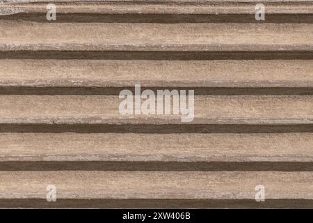 Striped stone background. Details and elements of architecture. Stone texture. Stock Photo