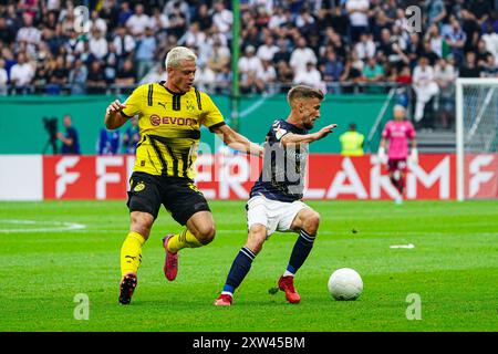 Julian Ryerson (Borussia Dortmund, #26), Corvin Bock (1. FC Phoenix Luebeck, #27)  GER, 1. FC Phoenix Luebeck vs. Borussia Dortmund, Fussball, DFB-Pokal, Runde 1, Saison 2024/2025, 17.08.2024  Foto: Eibner-Pressefoto/Marcel von Fehrn Stock Photo