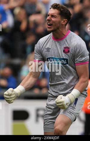 Carlisle United Goalkeeper Harry Lewis celebrates their goal during the Sky Bet League 2 match between Carlisle United and Barrow at Brunton Park, Carlisle on Saturday 17th August 2024. (Photo: Michael Driver | MI News) Credit: MI News & Sport /Alamy Live News Stock Photo