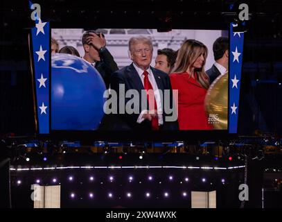 MILWAUKEE, Wis. – July 18, 2024: Donald Trump and Melania Trump appear onscreen at the Fiserv Forum during the 2024 Republican National Convention. Stock Photo