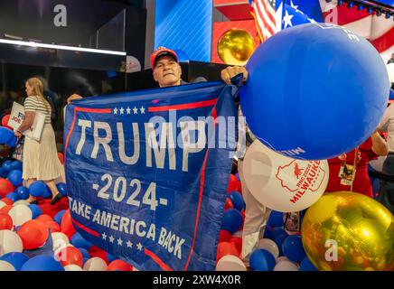 MILWAUKEE, Wis. – July 18, 2024: Attendees at the 2024 Republican National Convention are seen on the convention floor. Stock Photo