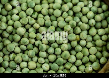 Peas Pisum sativum on olive wood for a pea  soup Stock Photo