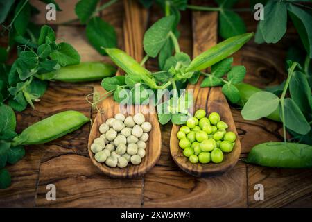 Peas Pisum sativum on olive wood for a pea  soup Stock Photo