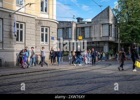 People stroll on main street Drottninggatan during the August fest. The August fest is an annual event in Norrköping, Sweden. Stock Photo