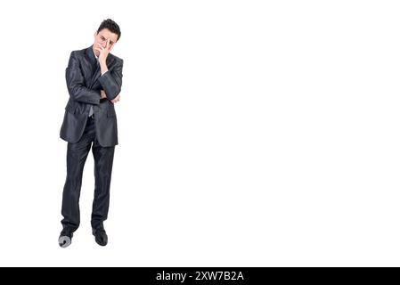 Thoughtful businessman doing facepalm gesture in studio Stock Photo