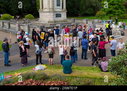 Bournemouth, Dorset, UK. 18th August 2024. Anti-immigration protestors hold 'Take Back Our Country' peaceful protest in Bournemouth. Counter-protestors organised their own protest at the same time in response to the far-right protest. Extra police resources from across the country have been brought in with police being given extra powers in light of violence and damage seen across the UK for similar protests and riots. Credit: Carolyn Jenkins/Alamy Live News Stock Photo