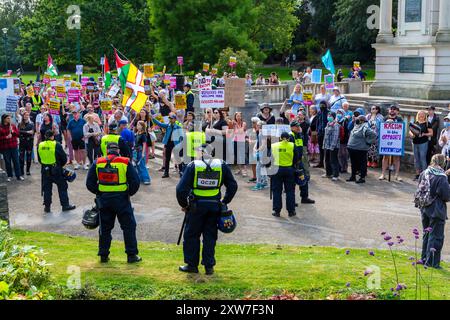 Bournemouth, Dorset, UK. 18th August 2024. Anti-immigration protestors hold 'Take Back Our Country' peaceful protest in Bournemouth. Counter-protestors organised their own protest at the same time in response to the far-right protest. Extra police resources from across the country have been brought in with police being given extra powers in light of violence and damage seen across the UK for similar protests and riots. Credit: Carolyn Jenkins/Alamy Live News Stock Photo