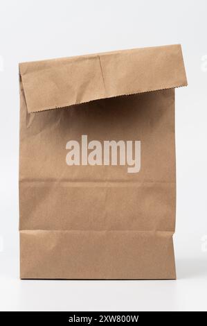 Wrinkled brown paper bag front view isolated on studio background Stock Photo