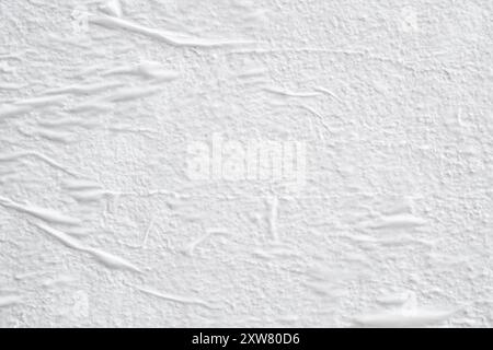 Blank white crumpled creased torn paper poster texture surface background Stock Photo